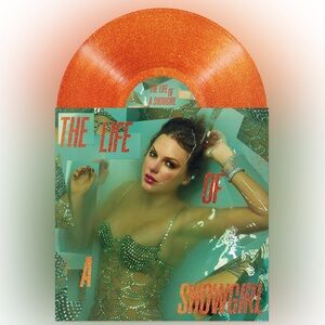 THE LIFE OF A SHOWGIRL: SWEAT AND VANILLA PERFUME PORTOFINO ORANGE GLITTER VINYL